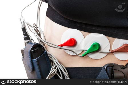 side view of recorder and sensors of Holter monitor for electrocardiogram on torso isolated on white background