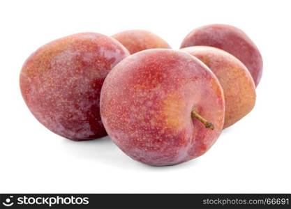 Side view of red ripe plums fruits isolated on white background
