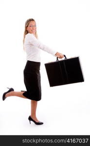 side view of smiling accountant holding briefcase on an isolated background