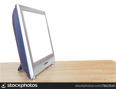 side view of TV set display with cut out screen on wooden table isolated on white background