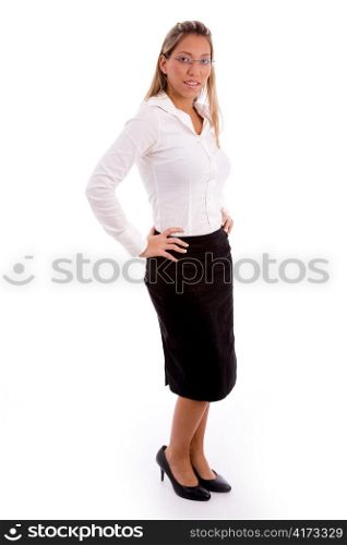side view of young businesswoman looking at camera with white background