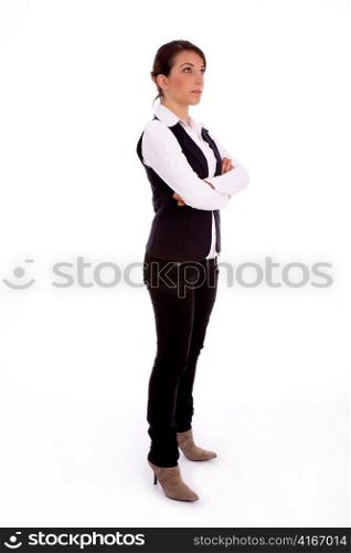 side view of young businesswoman looking upward against white background