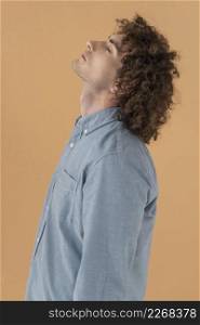 side view portrait curly haired young man