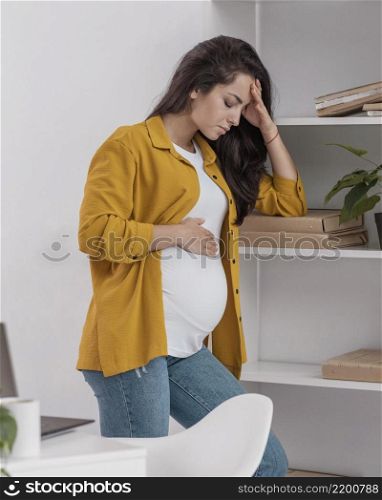side view pregnant woman home feeling very well