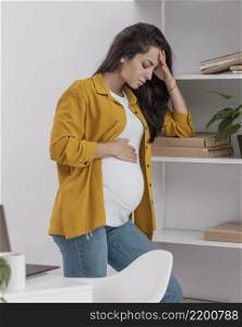 side view pregnant woman home feeling very well