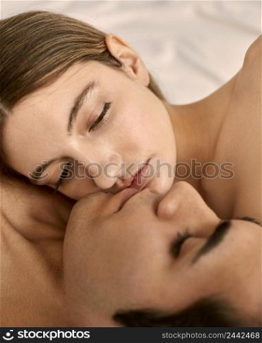 side view shirtless man woman bed