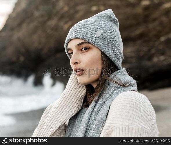 side view woman posing beach