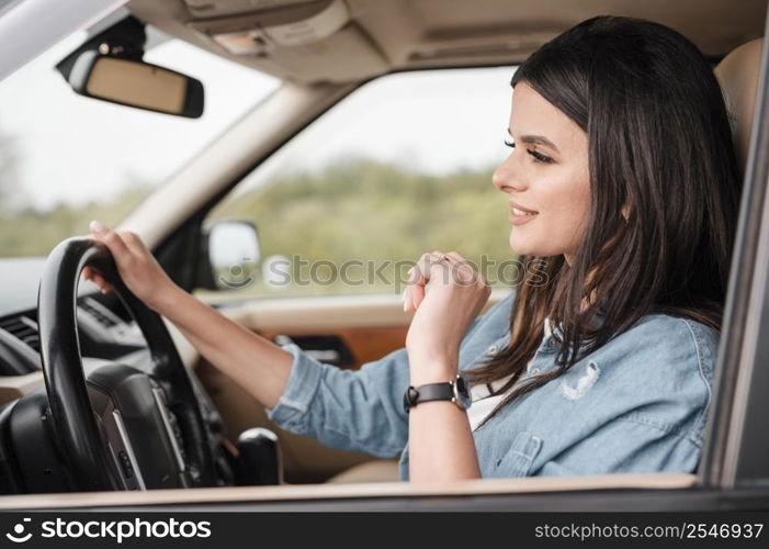 side view woman traveling alone by car