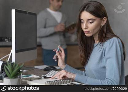 side view woman working media field with personal computer