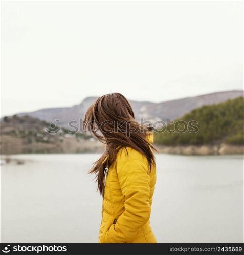 side view young beautiful woman nature