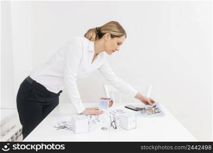 side view young businesswoman working office