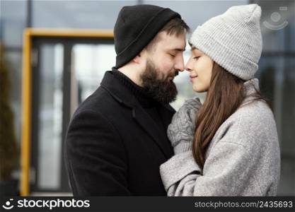side view young couple hugging 3