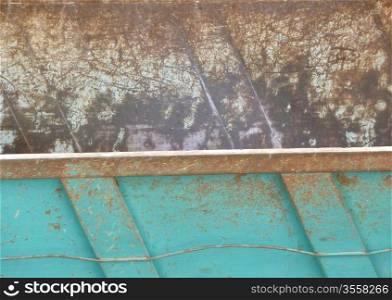 sides of a metal skip as a background