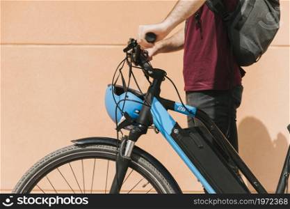 sideways cyclist standing e bike. High resolution photo. sideways cyclist standing e bike. High quality photo
