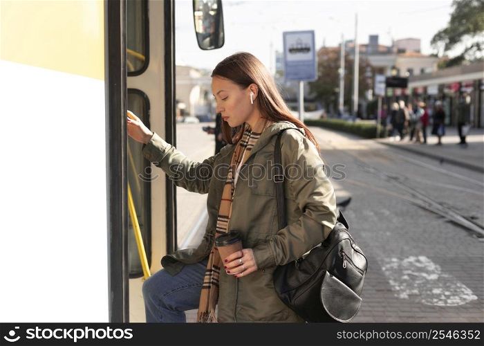 sideways passenger entering tram