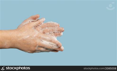 sideways person washing hands with copy space