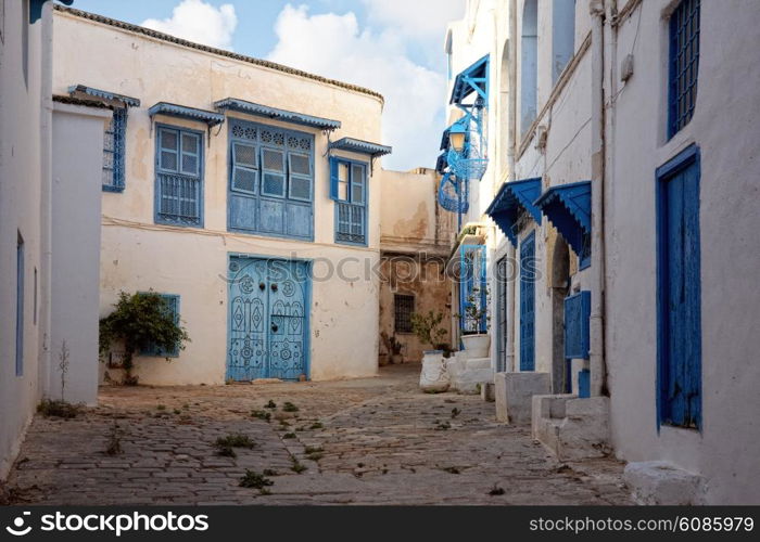 Sidi Bou Said - typical building with white walls, blue doors and windows, Tunisia