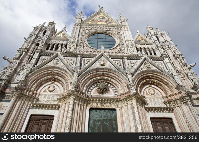 Siena Cathedral, also known as Duomo, built in French Gothic, Romanesque and Classical architectural styles.