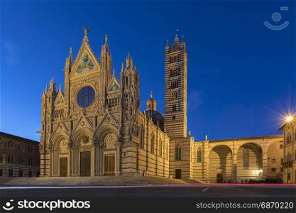 Siena - Italy. The 12th century Siena Cathedral (The Duomo) at dusk. A masterpiece of Italian Romanesque-Gothic architecture.