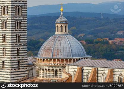 Siena. The Cathedral of the Blessed Virgin.. View of the dome of the cathedral. Sienna. Italy