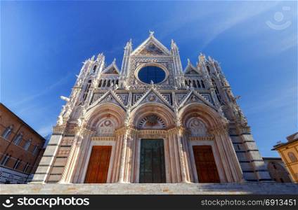 Siena. The Cathedral of the Blessed Virgin.. View on facade Cathedral of the Blessed Virgin. Siena. Tuscany. Italy.