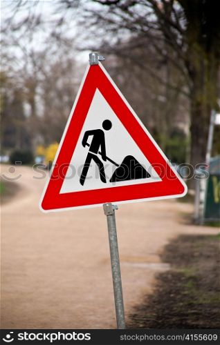 sign and traffic sign at a construction site