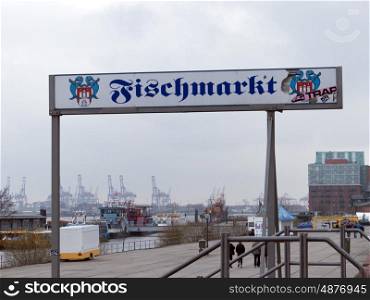 Sign at the entrance to the Hamburg fish market . Fish Market Hamburg Shield