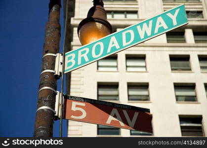 Sign board in front of a building, New York City, New York State, USA