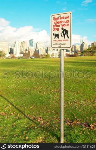 Sign clean up after your dog. Green park. Vancouver, Canada