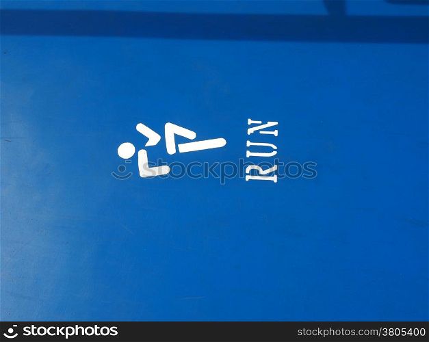 sign for run and walk tracks on the deck of cruise ship