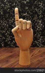 Sign language. A manikin hand signing the letter d
