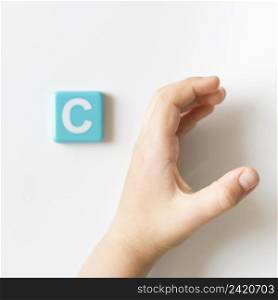 sign language hand showing letter c