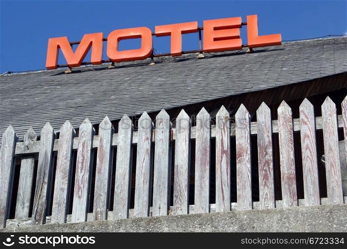 Sign of motel on the wooden house