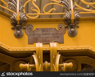 Sign on side of staircase in the Grand Palace in Paris France