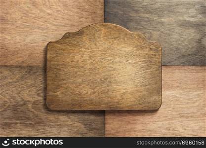 sign panel at wooden background. sign panel at wooden background surface