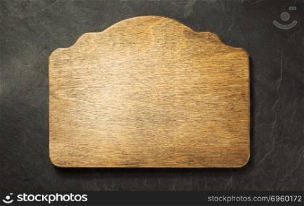 sign panel at wooden background. sign panel at wooden background surface