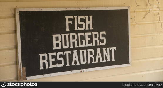 Signboard of a restaurant, Cayman Cay, Utila Island, Bay Islands, Honduras