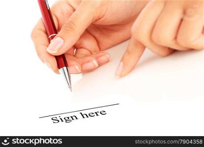 Signing the contract. Hand with pen isolated over white.