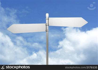 Signpost in blue sky with clouds