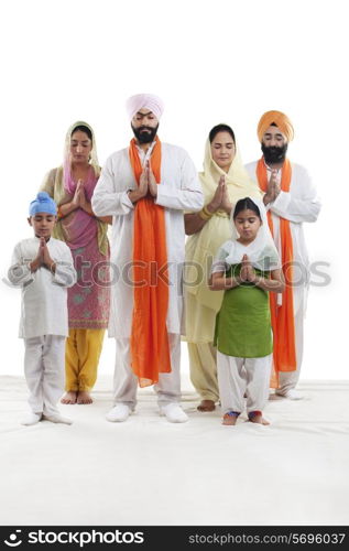 Sikh family praying