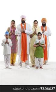 Sikh family praying