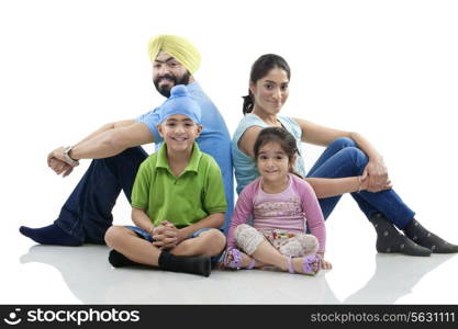 Sikh family sitting together