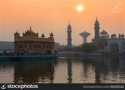 Sikh gurdwara Golden Temple (Harmandir Sahib) on sunrise. Amritsar, Punjab, India