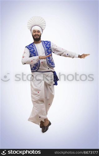 Sikh Man Doing Bhangra Dance