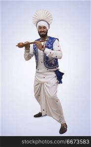 Sikh Man Doing Bhangra Dance
