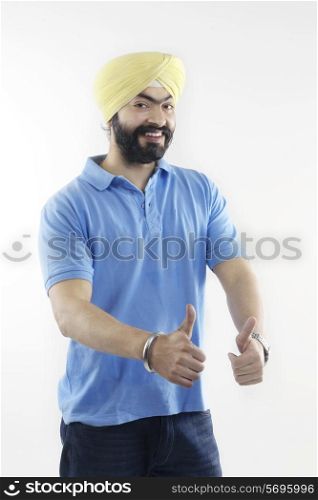 Sikh man giving thumbs-up