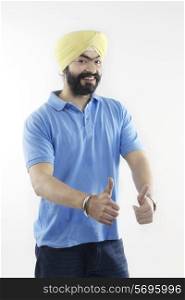 Sikh man giving thumbs-up
