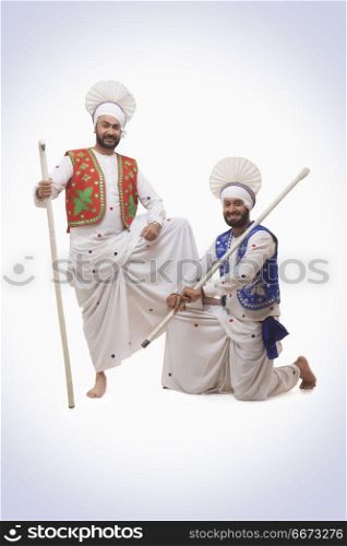 Sikh Man Holding With Khundis