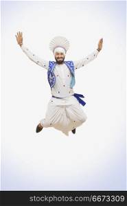 Sikh Man Jumping In The Air