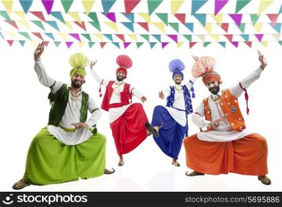 Sikh men dancing